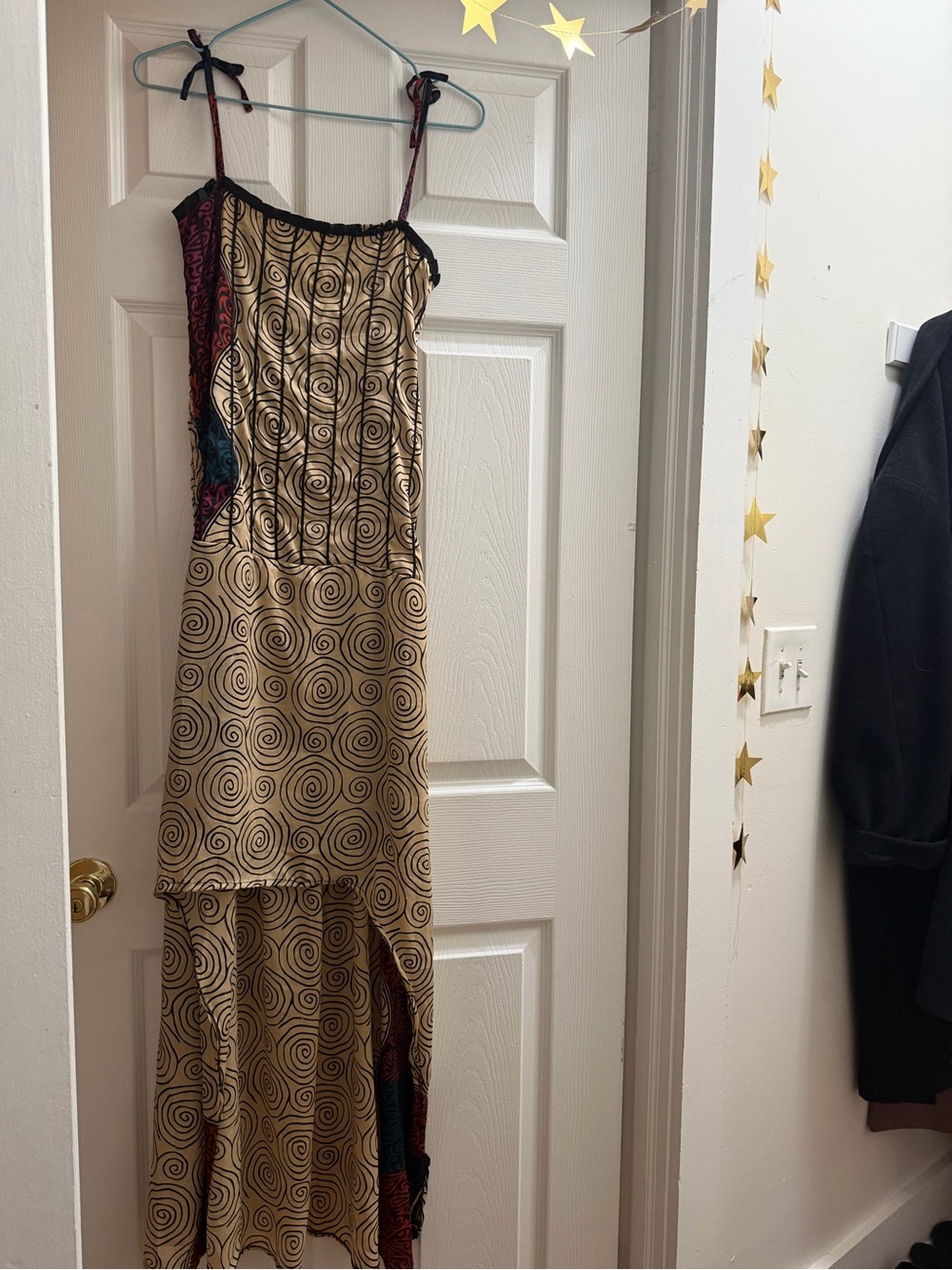 Sleeveless Spiral-Print Beige Maxi Dress with Contrast Panels